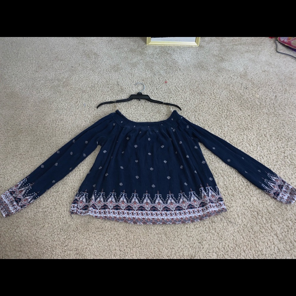 A off the shoulder long sleeve shirt